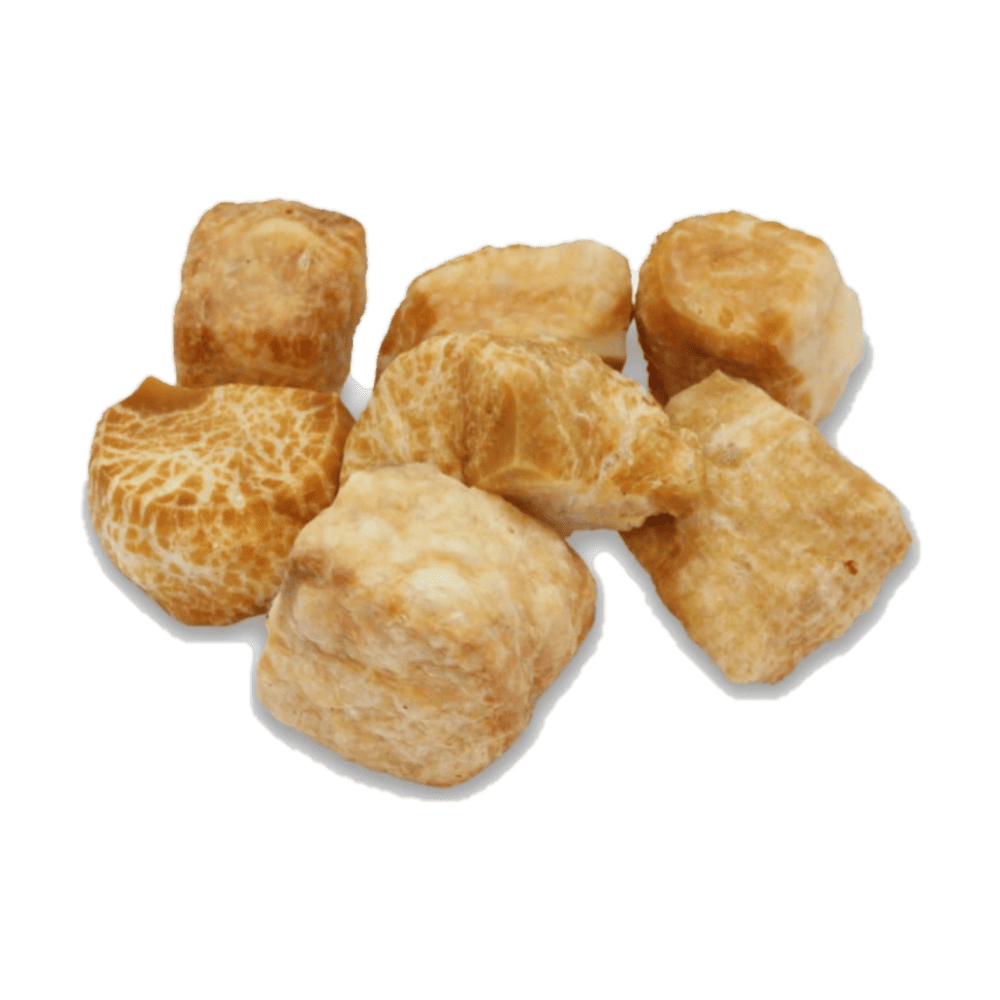 A collection of pork rinds on a green background.